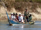 locals in boat.JPG (154 KB)